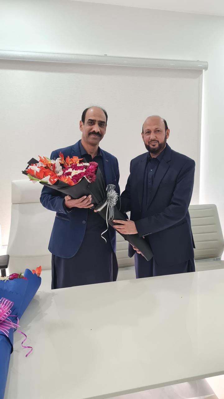 A cherished moment with a respected colleague